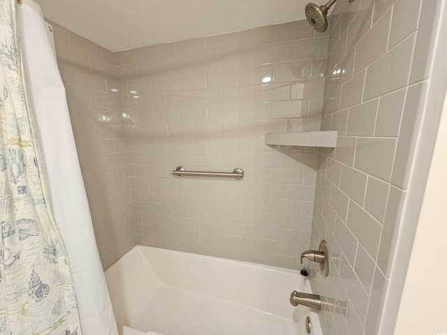 bathroom featuring shower / bath combo with shower curtain