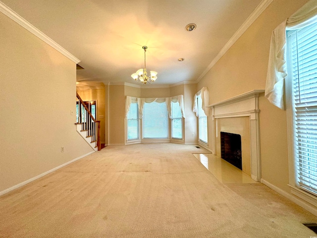 unfurnished living room featuring light carpet, an inviting chandelier, crown molding, and plenty of natural light