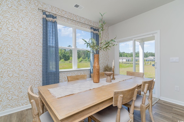 dining area featuring hardwood / wood-style floors