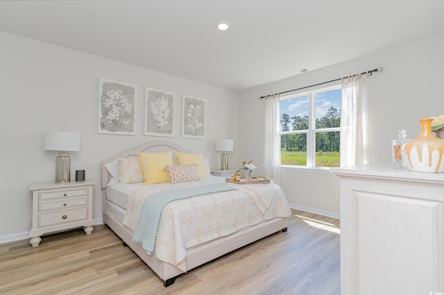 bedroom featuring light wood-type flooring