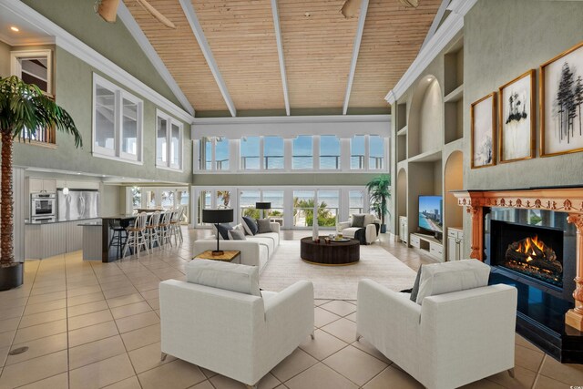 8000 Beach Dr, Myrtle Beach, SC 29572 - living room with built in shelves, light tile patterned floors, wooden ceiling, high vaulted ceiling, and a premium fireplace