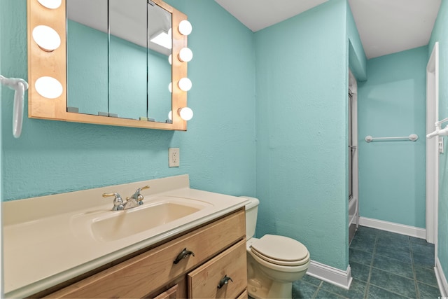 8000 Beach Dr, Myrtle Beach, SC 29572 - full bath featuring tile patterned floors, vanity, baseboards, combined bath / shower with glass door, and toilet