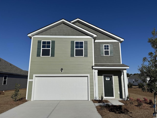 view of front of home with a garage