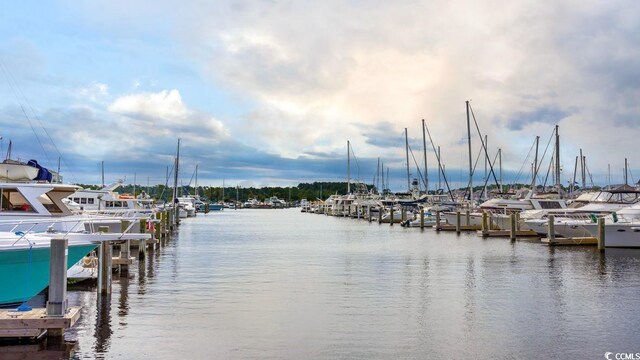 view of dock with a water view