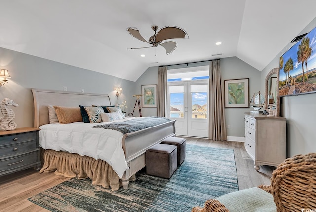 bedroom with lofted ceiling, light wood-type flooring, and ceiling fan