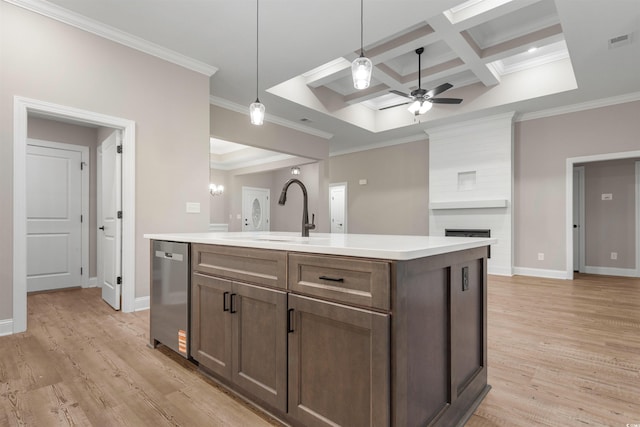 kitchen featuring visible vents, light wood-type flooring, a sink, coffered ceiling, and dishwasher