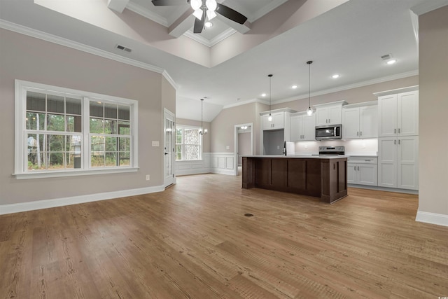 kitchen with visible vents, light wood-style flooring, white cabinets, appliances with stainless steel finishes, and crown molding