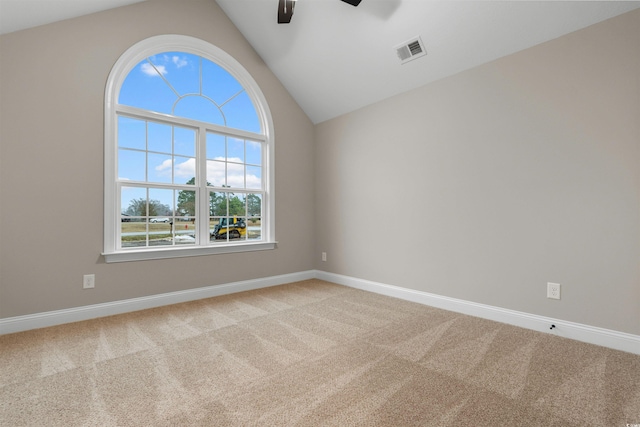 spare room with visible vents, carpet floors, and baseboards