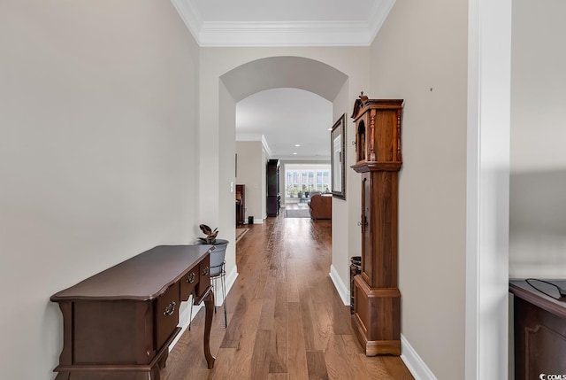 6620 Pozzallo Pl, Myrtle Beach, SC 29572 - hallway with crown molding, arched walkways, and wood finished floors