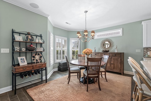 dining space with a chandelier and ornamental molding