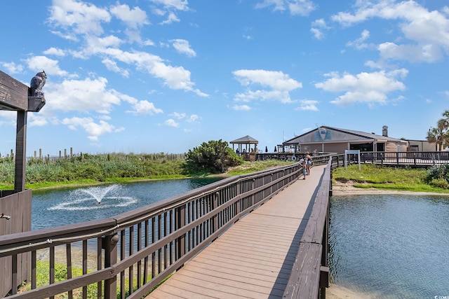 dock area featuring a water view