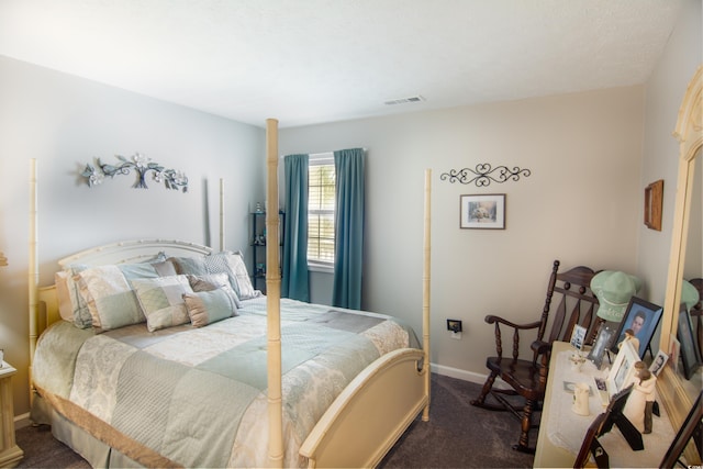 bedroom with carpet flooring, visible vents, and baseboards