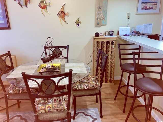 dining room featuring hardwood / wood-style flooring