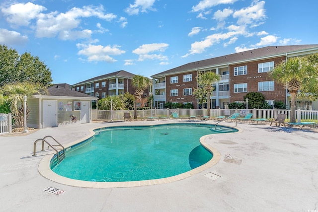 view of swimming pool featuring a patio