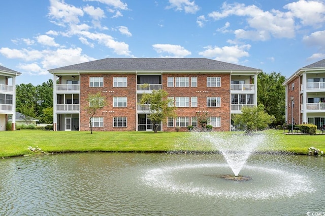 exterior space with a water view