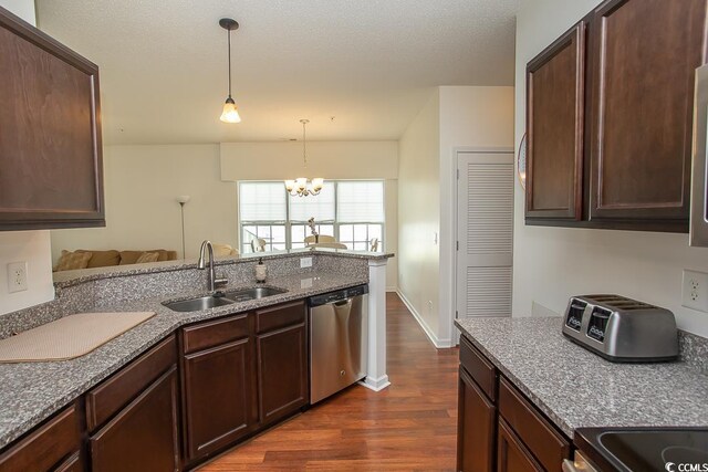 kitchen with sink, a chandelier, stainless steel dishwasher, dark hardwood / wood-style floors, and hanging light fixtures