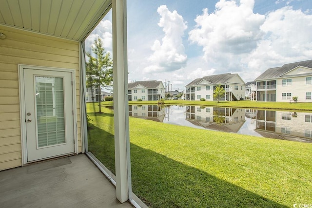 view of yard with a water view