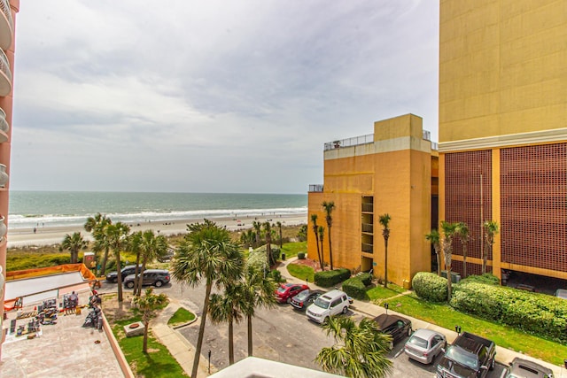 property view of water featuring a beach view