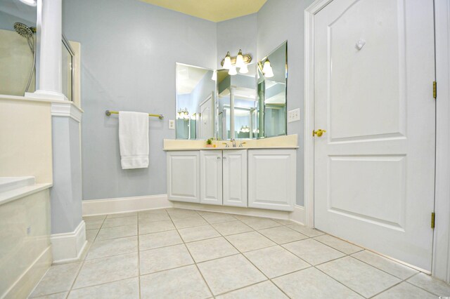 bathroom with vanity and tile patterned floors