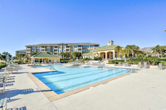 view of pool featuring a patio area