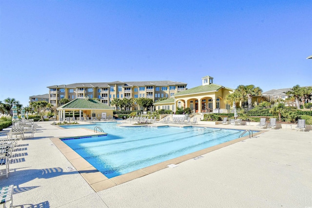 pool featuring a patio area