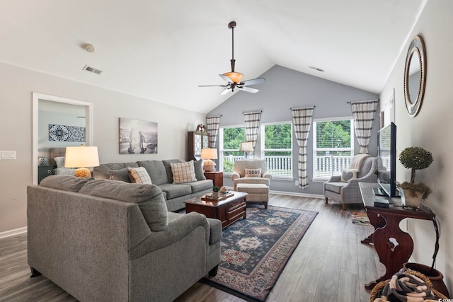 living room with ceiling fan, hardwood / wood-style flooring, and high vaulted ceiling