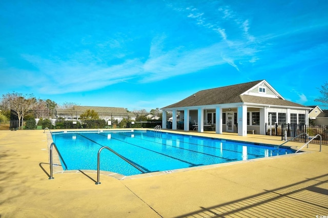 view of pool featuring a patio area