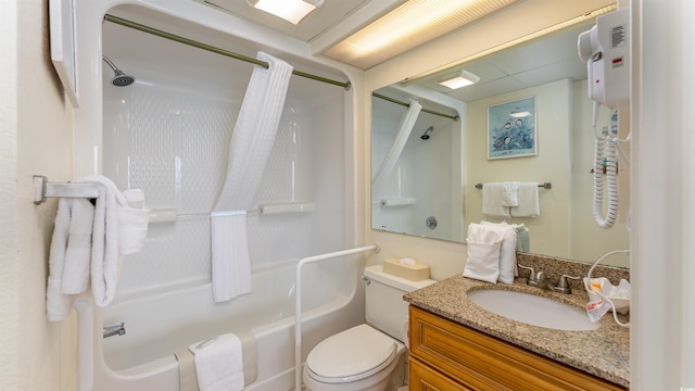 full bathroom with shower / bathtub combination with curtain, vanity, and toilet