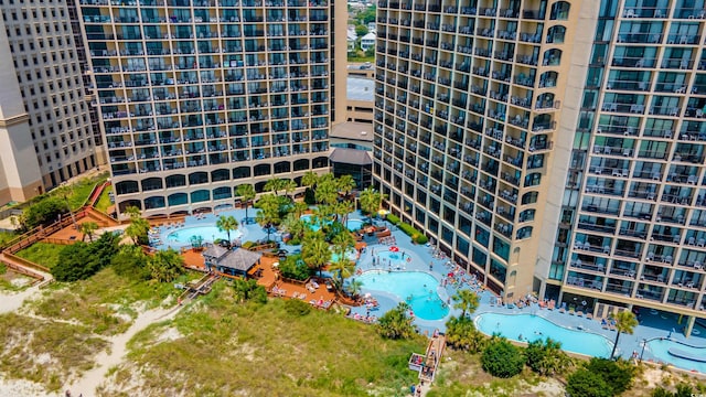 view of building exterior with a pool