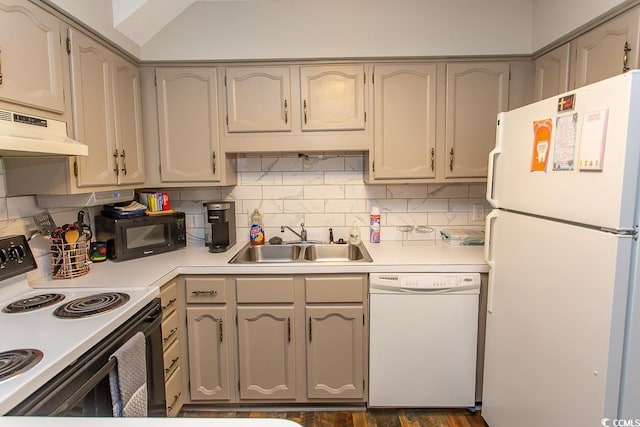 kitchen with backsplash, dark hardwood / wood-style flooring, white appliances, and sink