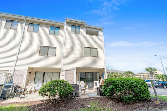 rear view of property with a patio