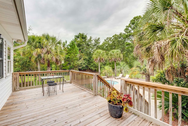 5414 Hampton Rd, Conway, SC 29527 - wooden deck with an outdoor pool and outdoor dining area