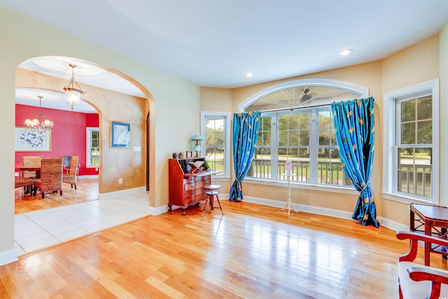 5414 Hampton Rd, Conway, SC 29527 - living area with arched walkways, a chandelier, plenty of natural light, wood finished floors, and recessed lighting