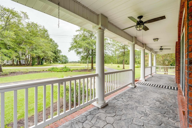5414 Hampton Rd, Conway, SC 29527 - covered porch featuring a ceiling fan and a yard