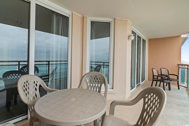 1321 S Ocean Blvd Unit 606, North Myrtle Beach, SC 29582 - balcony with outdoor dining area