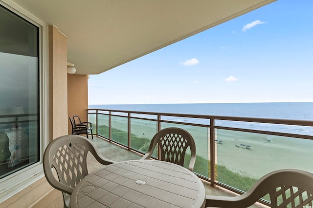 1321 S Ocean Blvd Unit 606, North Myrtle Beach, SC 29582 - balcony featuring a water view and outdoor dining space