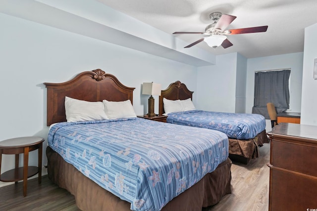 1321 S Ocean Blvd Unit 606, North Myrtle Beach, SC 29582 - bedroom featuring wood finished floors and ceiling fan