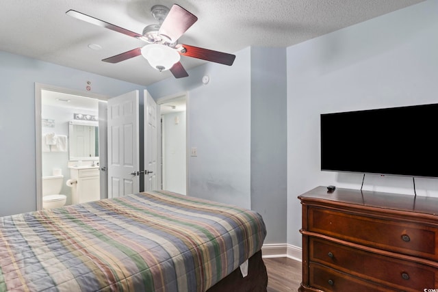 1321 S Ocean Blvd Unit 606, North Myrtle Beach, SC 29582 - bedroom featuring wood finished floors, ensuite bathroom, and ceiling fan