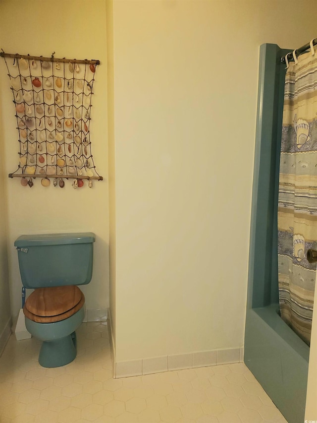 5864 Crestwood Dr, Myrtle Beach, SC 29578 - bathroom with tile patterned flooring and shower / tub combo