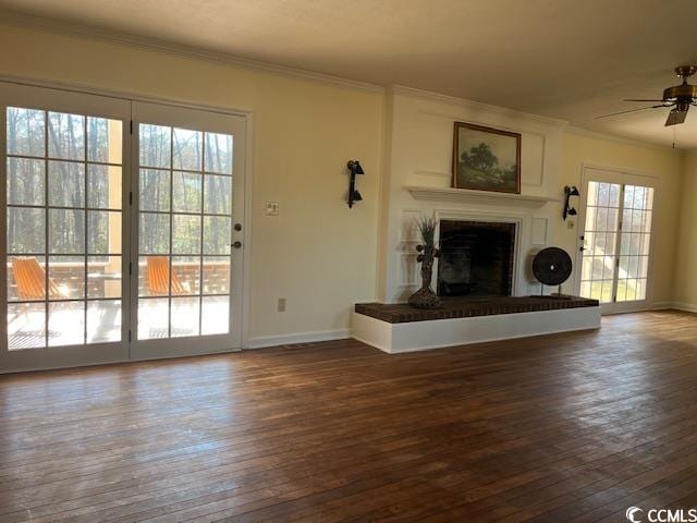 5864 Crestwood Dr, Myrtle Beach, SC 29578 - unfurnished living room with crown molding, hardwood / wood-style floors, ceiling fan, and a fireplace with raised hearth