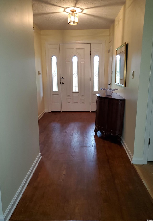 5864 Crestwood Dr, Myrtle Beach, SC 29578 - foyer featuring dark wood-type flooring and baseboards