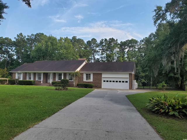 5864 Crestwood Dr, Myrtle Beach, SC 29578 - ranch-style home featuring concrete driveway, a garage, brick siding, and a front lawn