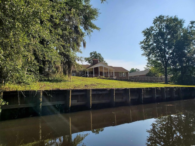5864 Crestwood Dr, Myrtle Beach, SC 29578 - dock featuring a yard