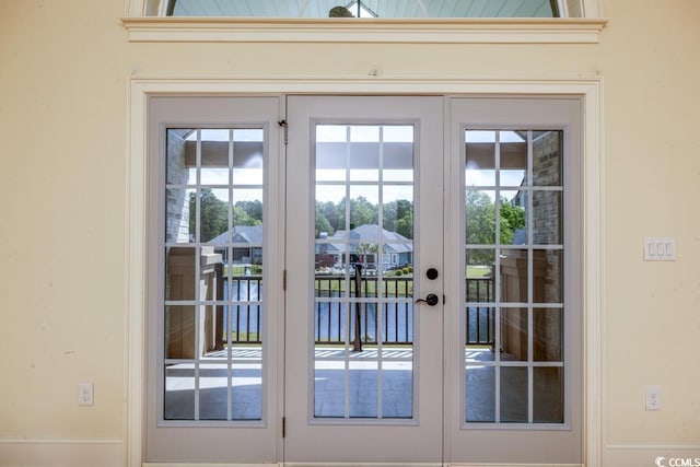 entryway featuring french doors