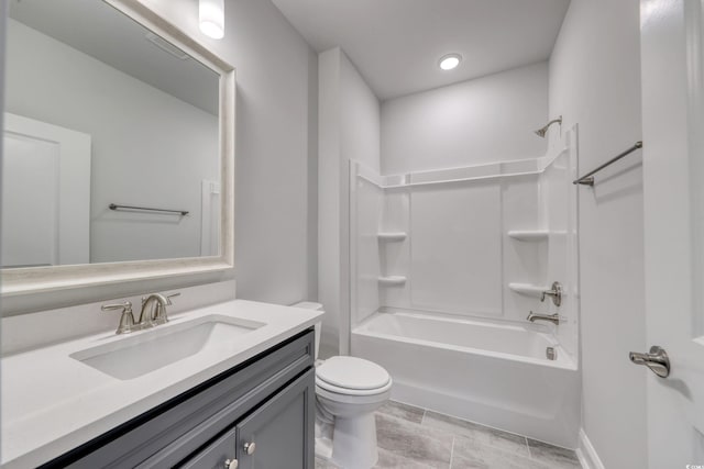 full bathroom with vanity, toilet, and tub / shower combination