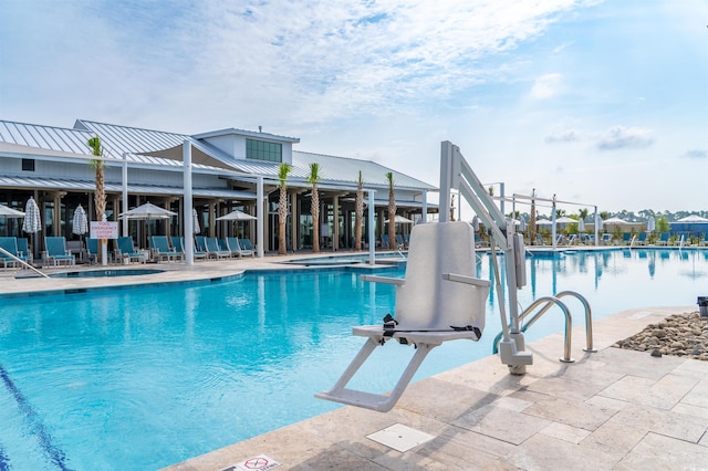 view of pool with a patio area