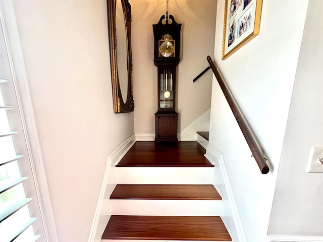 stairs featuring baseboards