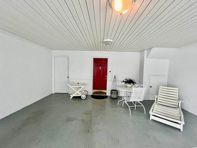 garage featuring wooden ceiling