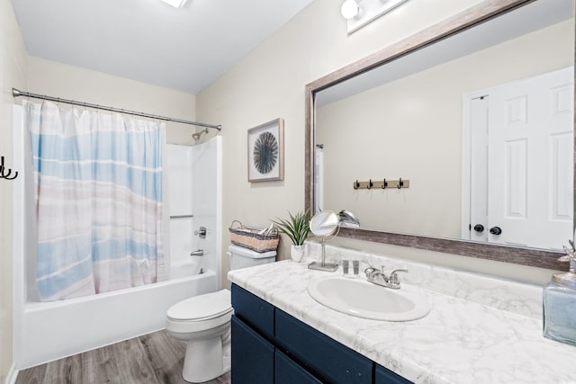 full bathroom with shower / bath combination with curtain, vanity, toilet, and hardwood / wood-style flooring