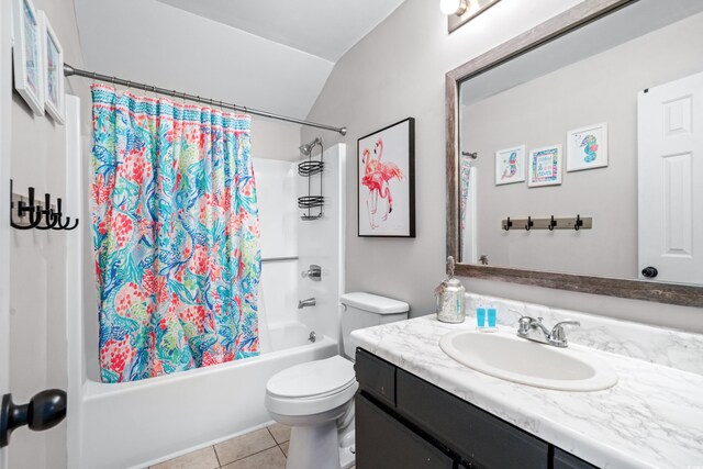 full bathroom with toilet, shower / tub combo with curtain, vanity, and tile patterned flooring